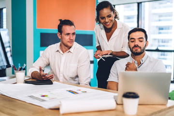 Group of professional business meeting and discussing strategy with new startup project.Creative business people planning and brainstorm with document report in modern workloft.Teamwork concept