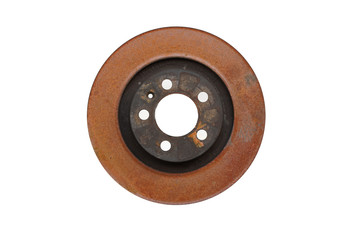 Old rusty brake disc from car isolated on white background