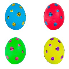 Multicolored eggs in close-up, isolated on a white background. Easter egg.