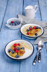 Wheat porridge with fruit and berries