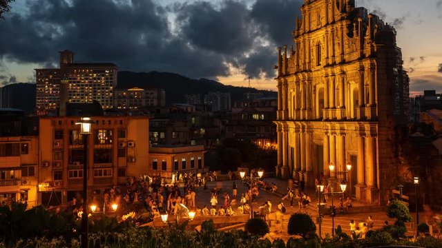 Macau - February 1, 2020 : Time lapse view of people at the historical district Christ church old of Macau, Historic Center of Macao. Awesome view of the Ruins of St. Paul's. Macau, China