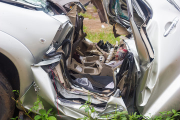 car damage from accident ,car crash or destroy park on grass wait insurance process and lawsuit