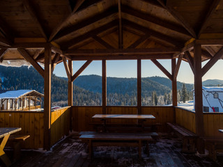 View from the gazebo in the ski resort Gornaya Salanga. Beautiful landscape with coniferous forest....