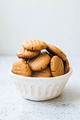 Crispy peanut butter cookies. Homemade vegan dessert. Vegan and vegetarian healthy food. In bowl or plate