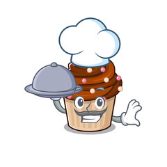 A picture of chocolate cupcake as a Chef serving food on tray