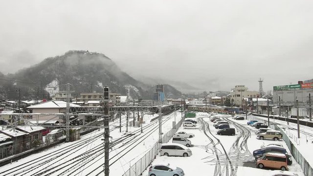Local cityscape with snow. Otsuki City, Japan