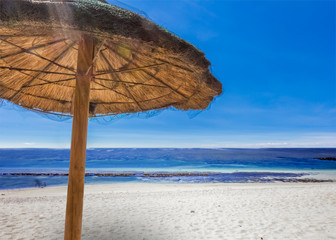 umbrella on the beach of Saint-pierre, Reunion island 