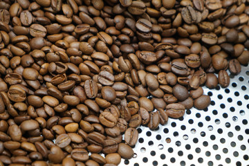 Coffee beans inside coffee maker
