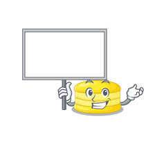 A cute picture of lemon macaron mascot design with a board