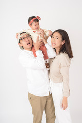 Fototapeta premium Happy Asian family on white background
