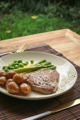 Grilled tuna steak served with asparagus