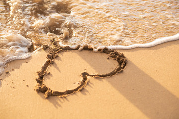 Symbol of love to be washed away by waves