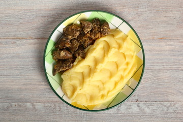 Fried chicken livers and mashed potatoes