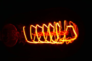 fire neon sign on black background