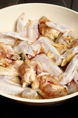 Frying chicken wings
