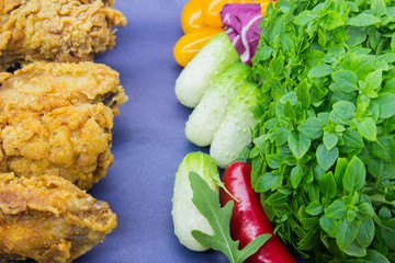 Healthy eating versus not healthy eating. The choice. Close-up. blue background