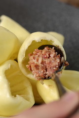 Stuff peppers with stuffing. Making Stuffed Peppers Series.