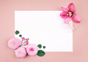 Flowers and white blank card. 