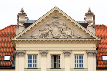 Fototapeta na wymiar Facade of 17th baroque century Mlodziejowski Palace on the Podwale street, Warsaw, Poland