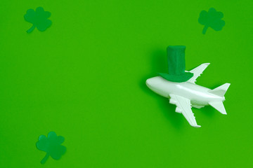 top view airplane with green hat and paper cut green leaves