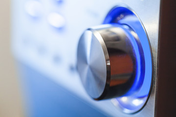 Shiny volume control knob with blue LED illumination