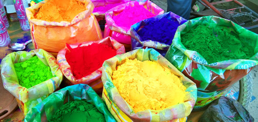 Colorful piles of powder sold on the market before Holi festival in India