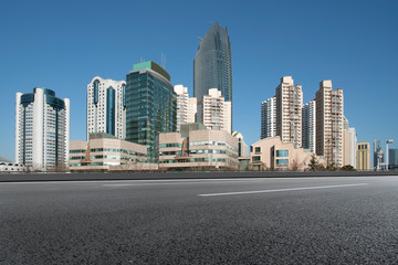 Fototapeta na wymiar Qingdao urban skyline and asphalt road architectural landscape..