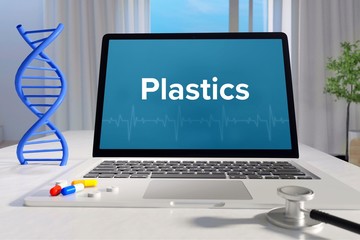 Plastics – Medicine/health. Computer in the office with term on the screen. Science/healthcare