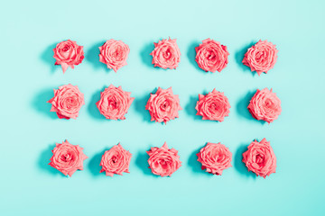 Beautiful flowers composition. Pink rose flowers on pastel blue background. Valentines Day, Easter, Birthday, Happy Women's Day, Mother's day. Flat lay, top view, copy space