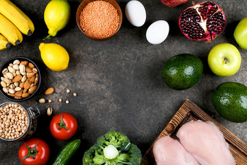 Healthy Nutrition Food Dieting Concept. Meat, vegetables, fruits and bean product on slate table background. Top view, flat lay, copy space