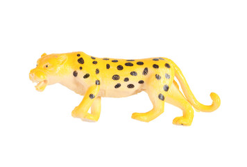 Plastic leopard doll isolated on white background