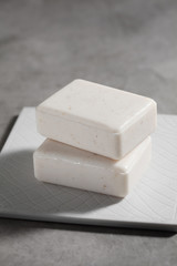 Organic soap for spa on rustic background.