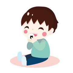 A smiling boy chewing onigiri