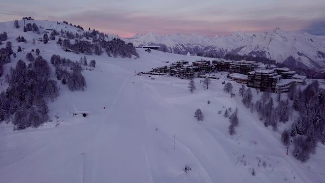 Flying over the winter wonderland by the popular Thyon Ski Resort in Switzerland