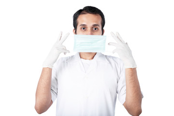 Asian doctor man in protective gloves wearing a flu mask