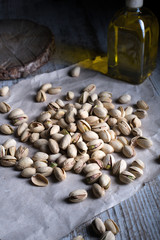 still life of isolated pistachios in the foreground in studio.