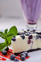 cheesecake with fresh blueberries and mint