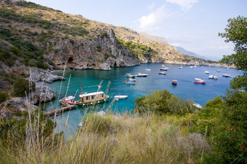 Infreschi Bay, Vessels moored in the bay Baia degli Infreschi on the Masseta coast of Cilento in Italy in summer