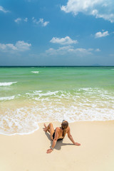 Fototapeta na wymiar Woman at the beach in Thailand