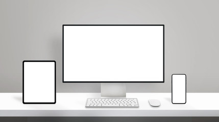 Responsive design on modern different display devices mockup. Computer display, tablet and smart phone on clean office desk