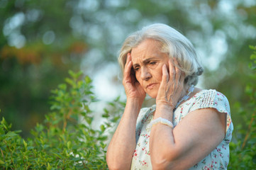 Close up portrait of sad senior beautiful woman