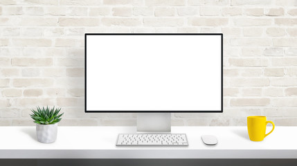 Computer display with isolated, blank, white screen for web site presentation mockup. Concept of designer studio