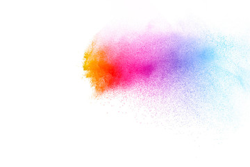 Colorful background of pastel powder explosion.Multi colored dust splash on white background.Painted Holi.