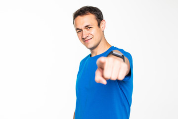 Fototapeta premium Handsome young man gesturing with his hand, pointing finger at you, isolated on white background