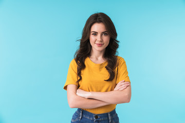 Positive young pretty woman posing isolated