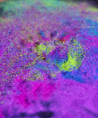 Colorful holi powder blowing up. Holi festival and celebration. Background.