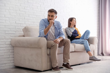 Unhappy couple with problems in relationship at home