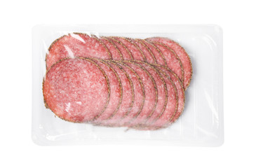 Slices of tasty sausage on white background, top view