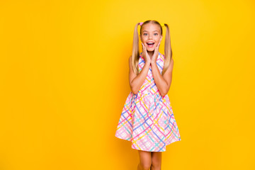 Photo of pretty funny excited little lady holding hands on cheeks unexpected surprise open mouth...