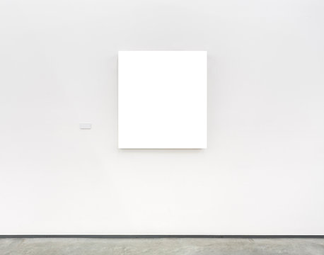 Blank White Frame On Museum Wall With Caption